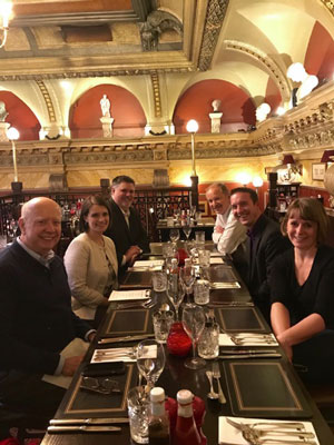 UF MMME faculty poses at a dinner during the ISAME Symposium